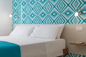 Postel nebo postele na pokoji v ubytování B&B Fiori D Arancio Sorrento + 2 fotografie