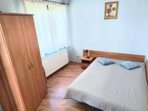 Dom Gościnny AgCez客房内的一张或多张床位