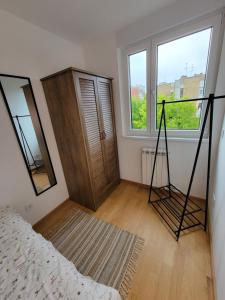 Postel nebo postele na pokoji v ubytování Park Residence, Mirijevo, Beograd