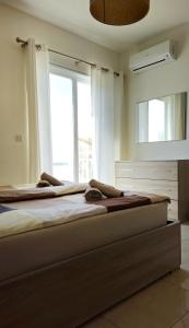Postel nebo postele na pokoji v ubytování Calypso Apartment + 23 fotografií