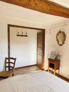 Postel nebo postele na pokoji v ubytování La Bastide des Pins