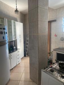 Kuchyň nebo kuchyňský kout v ubytování Apartamento no bairro da Saúde