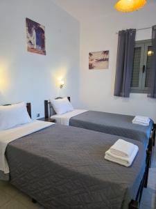 Una cama o camas en una habitación de Calypso Heaven