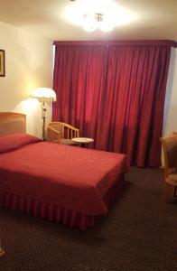 Posteľ alebo postele v izbe v ubytovaní Primorye Hotel