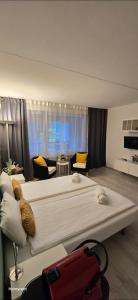 Postel nebo postele na pokoji v ubytování Residenza Lago di Lugano