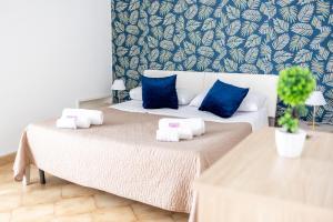 Postel nebo postele na pokoji v ubytování Zangara Flat