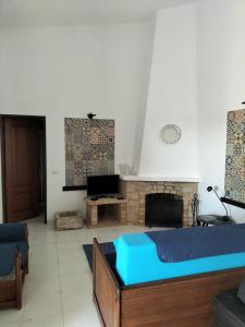 TV a/nebo společenská místnost v ubytování Casa dos Avós