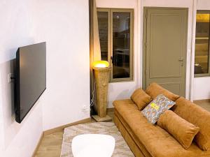 Μια τηλεόραση ή/και κέντρο ψυχαγωγίας στο Appartement charmant