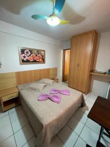 En eller flere senge i et værelse på Acqua City 2 Flats 703