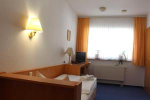 Μια τηλεόραση ή/και κέντρο ψυχαγωγίας στο Pension Lindenhof +32 φωτογραφίες