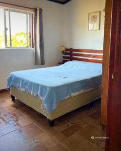 Postel nebo postele na pokoji v ubytování Posada del Pio, Granja