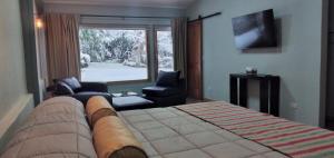 Postel nebo postele na pokoji v ubytování Espacio de Montaña