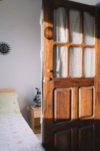 Una cama o camas en una habitación de Casa Tota
