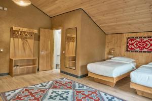 Postel nebo postele na pokoji v ubytování Pristine Hotel
