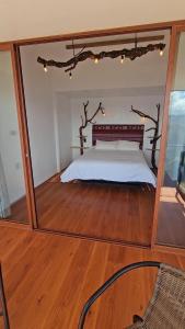Ένα ή περισσότερα κρεβάτια σε δωμάτιο στο Pucara Lodge