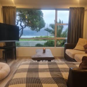 Χώρος καθιστικού στο Beach Front Paradise