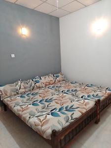 Postel nebo postele na pokoji v ubytování Corner Cottage - Anuradhapura