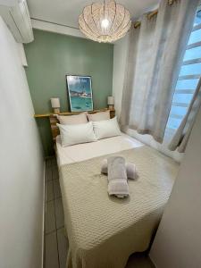 Letto o letti in una camera di Kay Agapi - Apt T3 sur la plage - Diamant