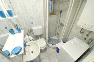 Kúpeľňa v ubytovaní Apartment Duje + 24 fotografií