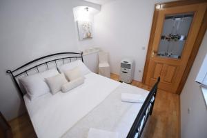 Posteľ alebo postele v izbe v ubytovaní Apartment Duje