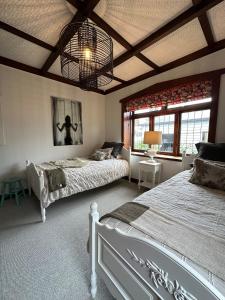 Voodi või voodid majutusasutuse Victoria Bungalow toas +54 fotot