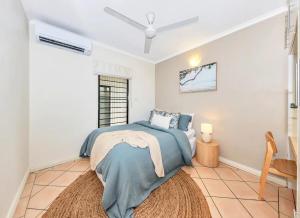 Ένα ή περισσότερα κρεβάτια σε δωμάτιο στο Tropical Dream Home
