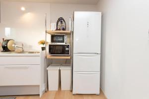 Köök või kööginurk majutusasutuses 新築 MUJI House 無印良品の家 新宿まで20分 駅まで徒歩7分 Walmart, Don Don Donki and 成城石井 at Tanashi Station