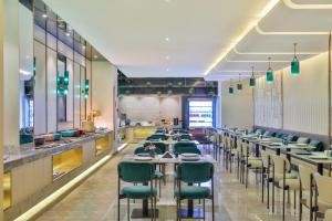 Veitingastaður eða matsölustaður á Crystal Orange Hotel Shanghai Hongqiao Jinhui Road