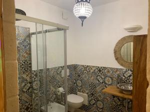 Vannituba majutusasutuses Trulli Santa Maria Odegitria Relais