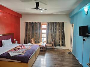 Postel nebo postele na pokoji v ubytování TSASKAN hotel