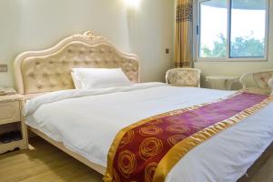 Postel nebo postele na pokoji v ubytování Wuduria Hotel + 37 fotografií