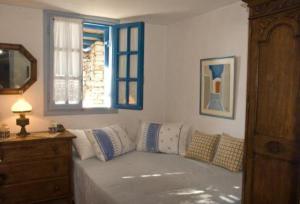 Llit o llits en una habitació de Windmill Studios