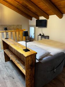 Postel nebo postele na pokoji v ubytování Monolocale Giuggiola