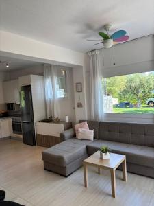 Posezení v ubytování Villa Evita Garden Floor Suite