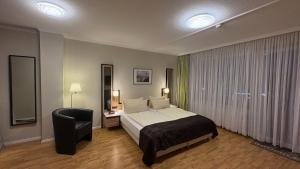 Postel nebo postele na pokoji v ubytování Hotel Windspiel