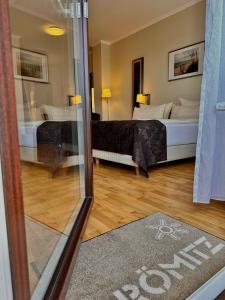 Postel nebo postele na pokoji v ubytování Hotel Windspiel