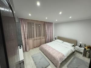 Postel nebo postele na pokoji v ubytování ASE Premium Apartament 2