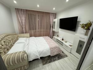 Postel nebo postele na pokoji v ubytování ASE Premium Apartament 2