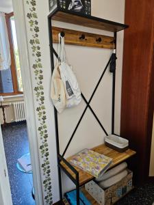 a shelf in the corner of a room at Vista Lago in Luino