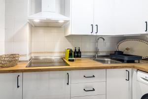 Kuchyňa alebo kuchynka v ubytovaní Sea & Wave Nuño Apartment