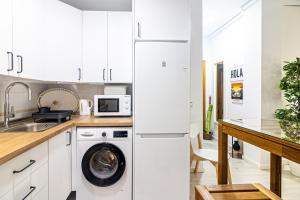 Kuchyňa alebo kuchynka v ubytovaní Sea & Wave Nuño Apartment
