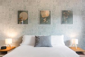 Posteľ alebo postele v izbe v ubytovaní Sea & Wave Nuño Apartment