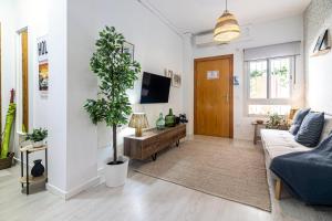 Televízia a/alebo spoločenská miestnosť v ubytovaní Sea & Wave Nuño Apartment