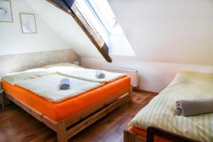 Postel nebo postele na pokoji v ubytování Ubytování Pod Světem-rodinný dům