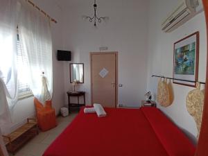Giường trong phòng chung tại B&B Casa Rosati