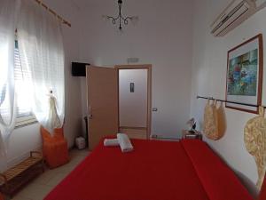 Giường trong phòng chung tại B&B Casa Rosati