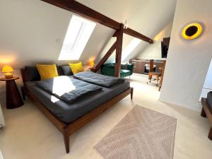 Postel nebo postele na pokoji v ubytování IDYLLE AM FLUSS nur 5 Minuten zum Europapark und direkt am Naturschutzgebiet