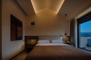 Shaxi Fengyasong Village Hotel客房内的一张或多张床位