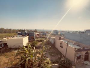 a view of a city from the top of a building at Vishram Guest House in Jhājra