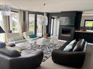 Posezení v ubytování Magnifique Villa